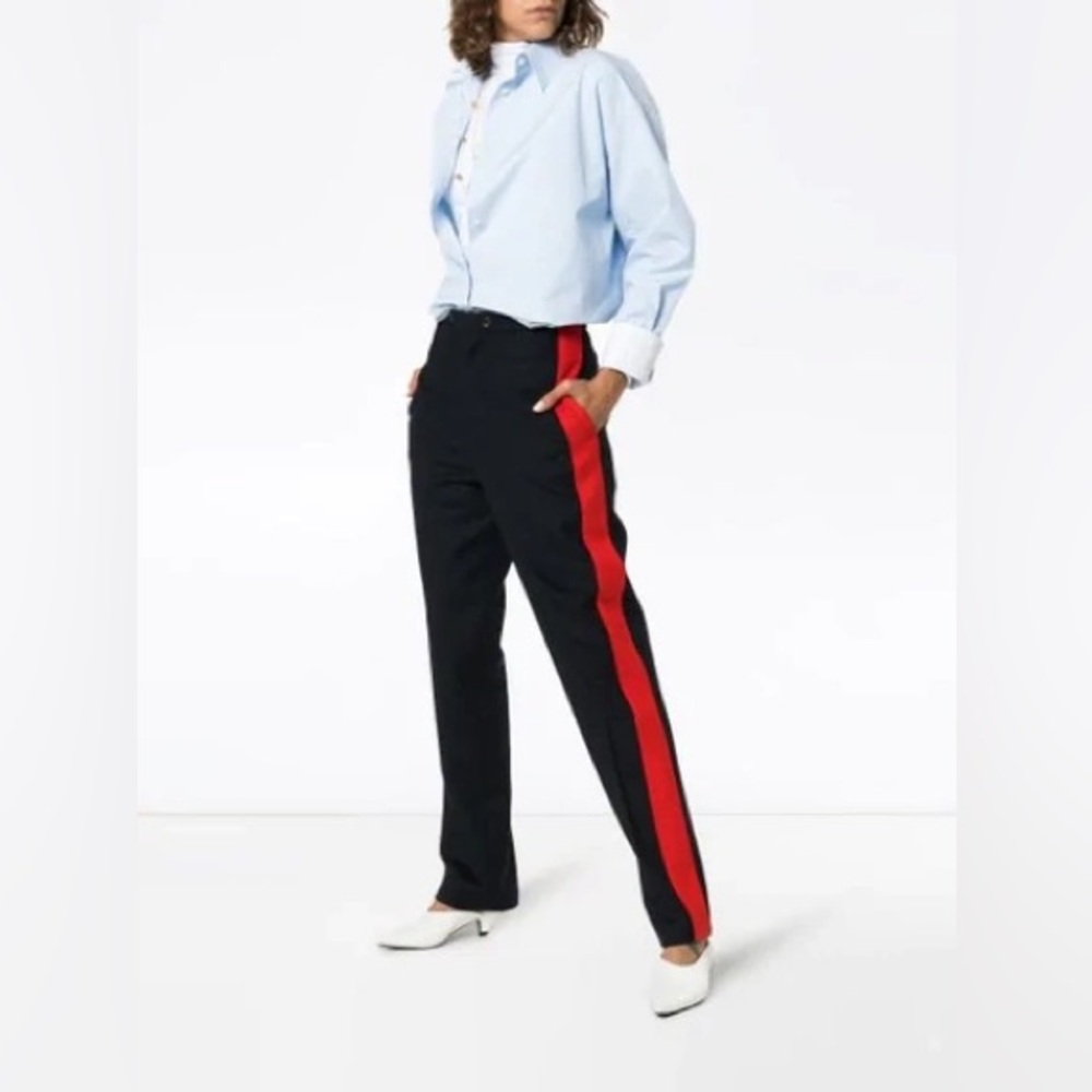 JOSEPH Annam navy tuxedo pants with red stripes.